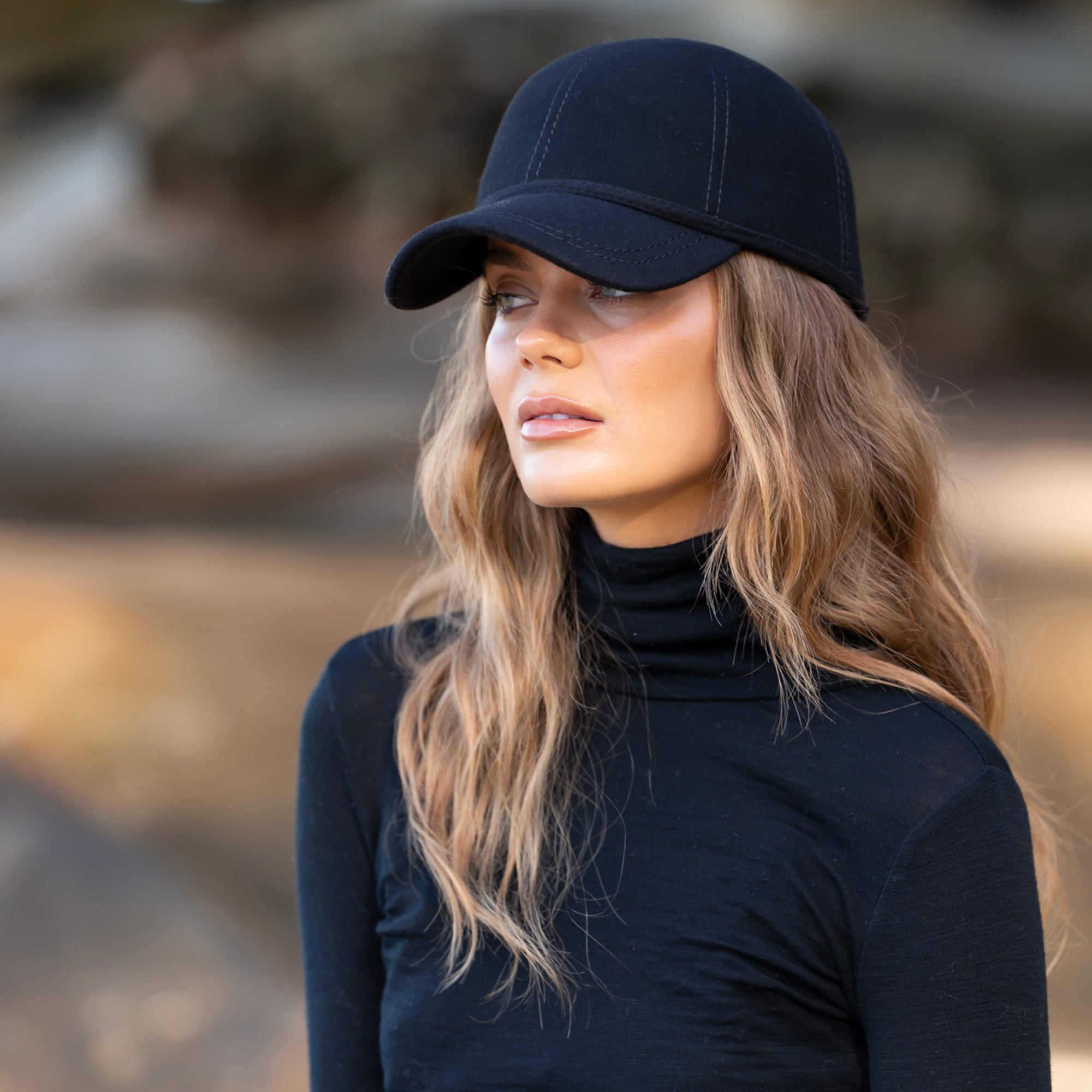 Black Woollen Cap - low is stock